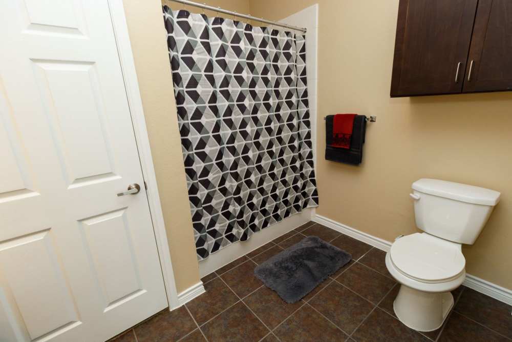 Bathroom with hard flooring at North Court Villas in Frisco, Texas